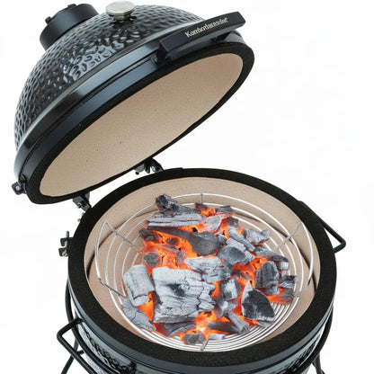 Angled kamado with burning charcoal